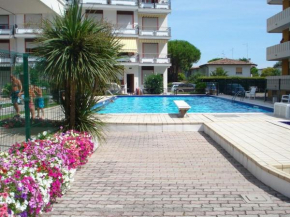 Superb Apartment with swimming pool in front of the beach